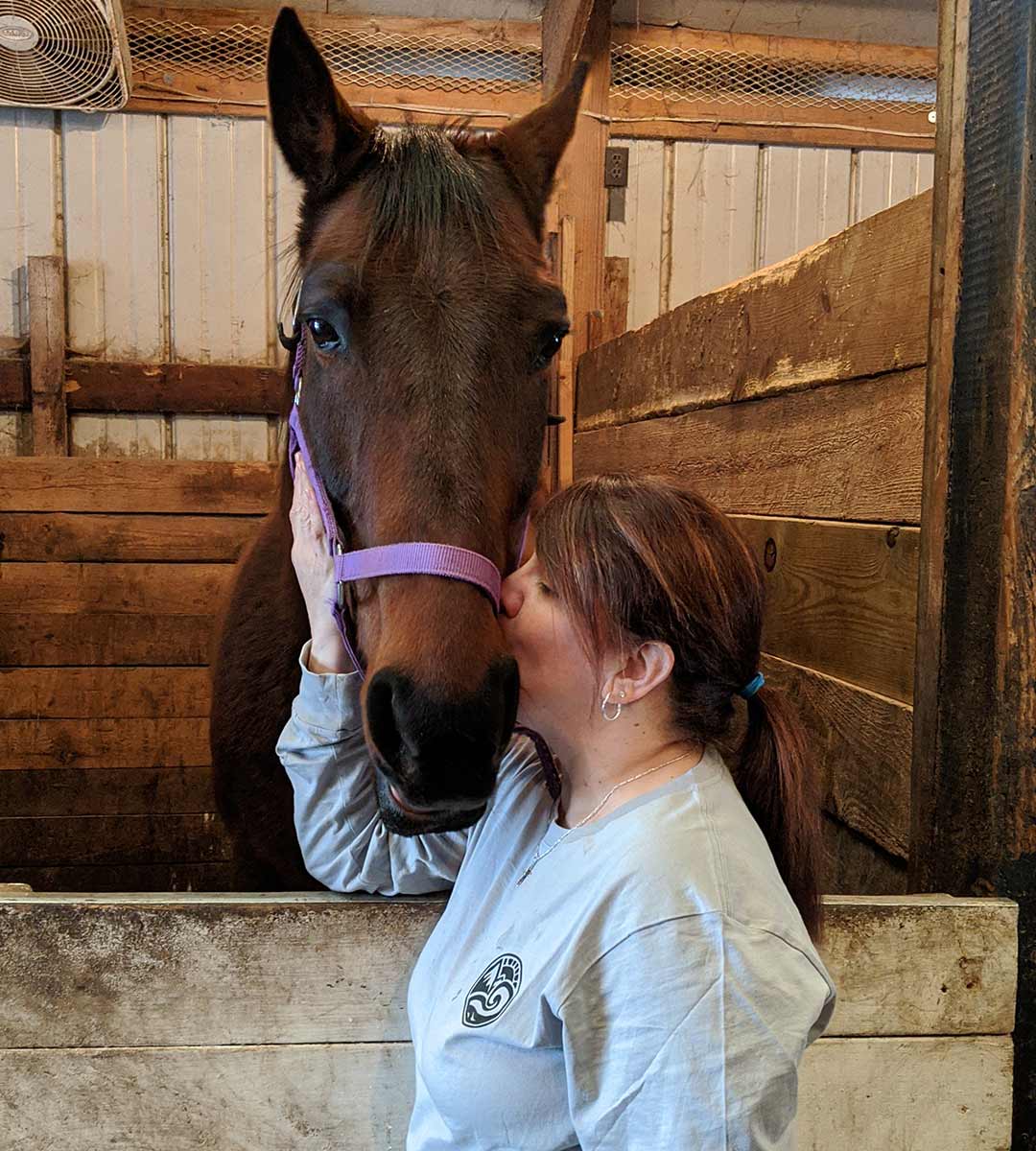 Peaceful Valley Candle Co. founder with horse Benjamin